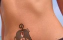 Tatuaż na brzuchu: Małpa