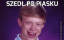 Szedł po piasku